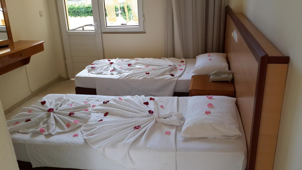 Caner Hotel Kemer Quarto foto
